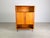 One of two beautiful vintage cabinets from the 1960s/1970s. The piece features two large doors and two open compartments...