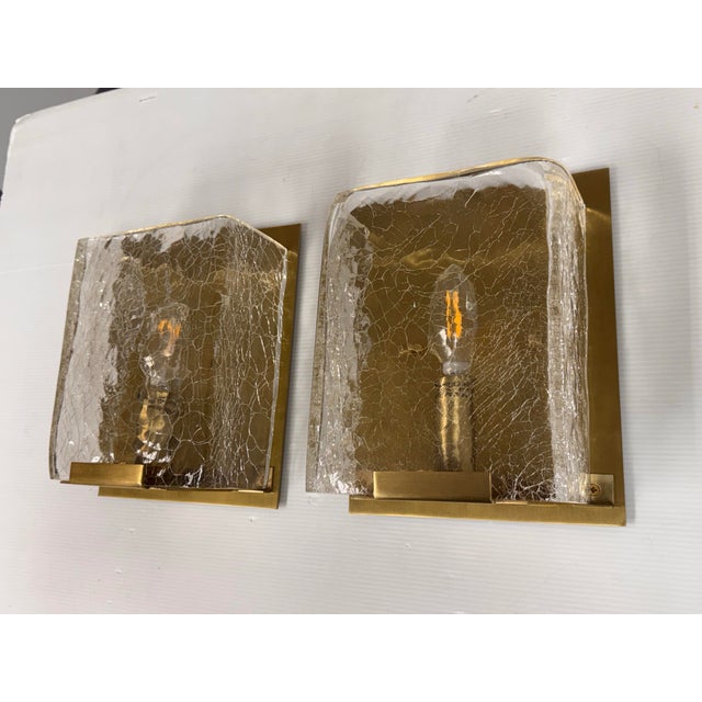 Design Plus Gallery presents a Pair of the London Sconces from Fuse Lighting. Each fixture pairs a rectangular brass-tone...