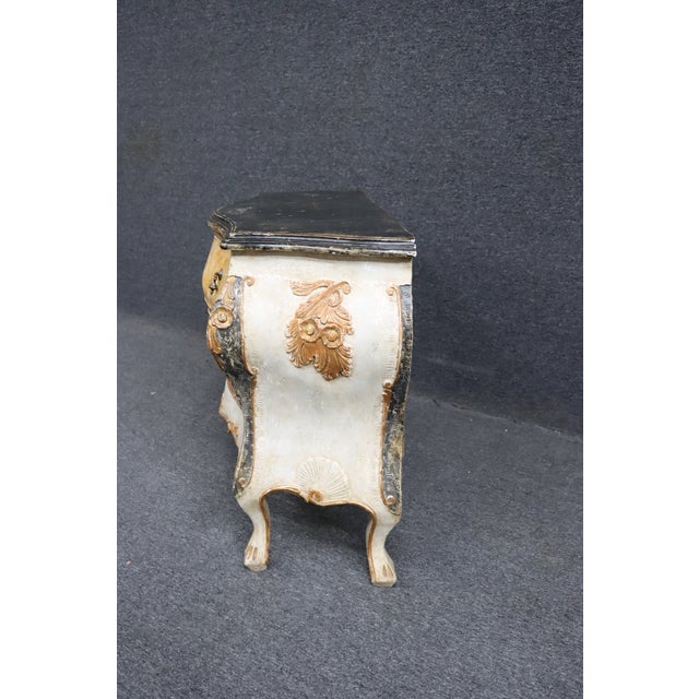 Paint Decorated Italian Baroque commode with ornate carved accents.