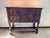 Manufactured by Teeangee of Ipswich, England. Believed to be crafted of solid oak, this charming English side cabinet...