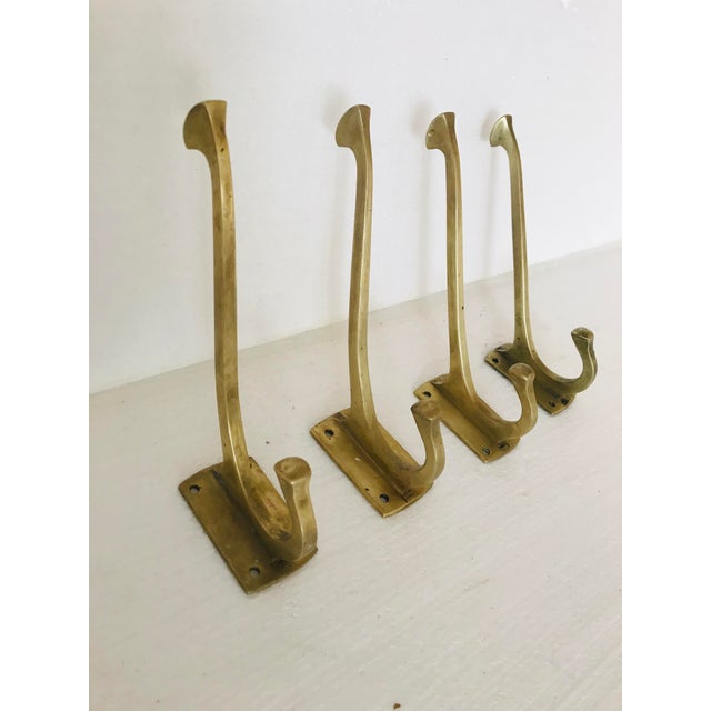 1900 Viennese Art Deco Art Neaveau brass wall hooks. Set of 4 pcs.