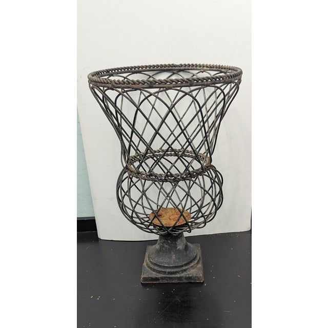 Cast iron base, braided top.