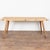 Early 20th century rustic console table crafted in hardwood with darker squared legs that splay slightly outward. The...