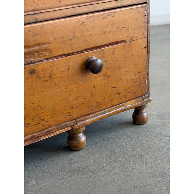 W41.5 D20 H44 Vintage wood secretary chest featuring a curved gallery back, open shelving, two spacious drawers, and...