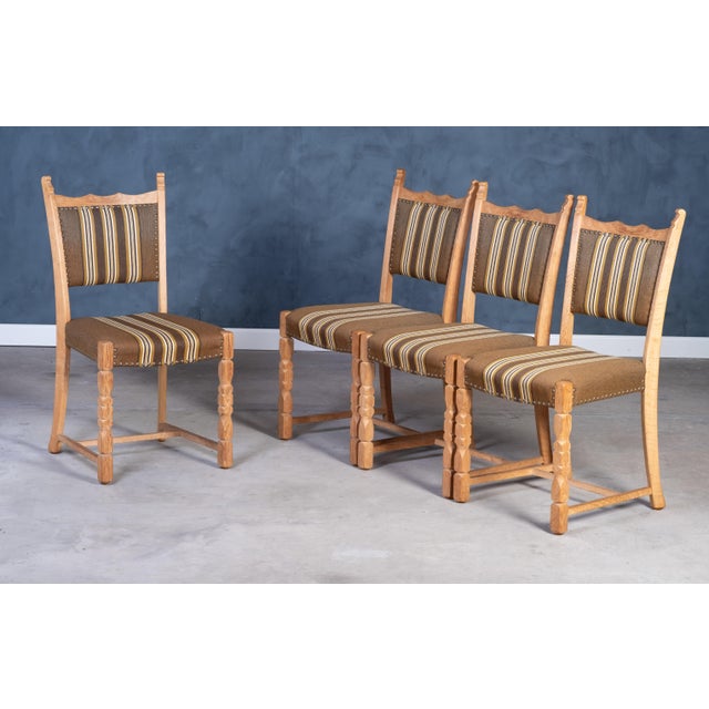 These beautiful antique chairs are crafted from solid oak, featuring intricate scrollwork and exquisite detailing. Dating...
