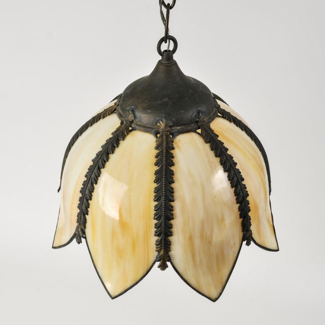 A beautiful mid century tulip pendant light in good condition with 8 marbled cream color slag glass petals. New socket and...