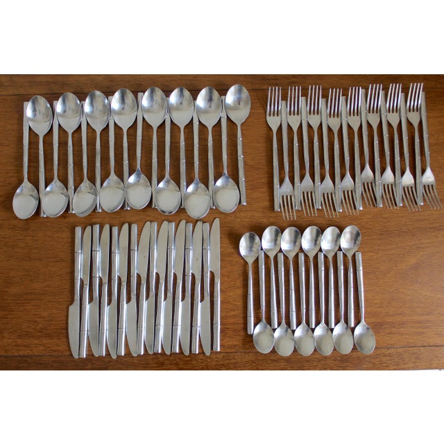 Elevate your table with this exceptional vintage 1980s Stanley Roberts "Tiburon" flatware collection, a highly sought-...