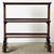 An exceptional serving trolley in the Regency style, from 19th century England, made of dark mahogany which brings a sense...