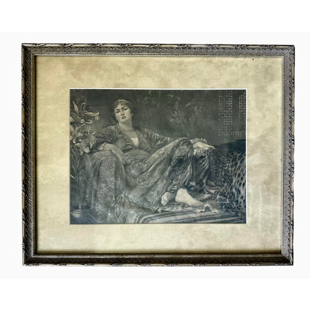 A framed engraving after Sir Frank Dicksee's oil painting, "Leila (1892)" depicting a Middle Eastern woman reclining in...