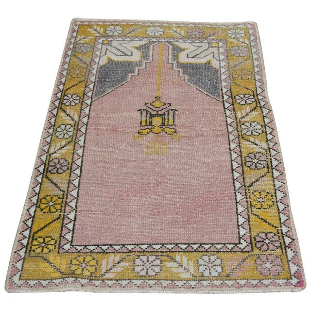 Hand-knotted with care using traditional rug-making techniques, this wool rug blends timeless craftsmanship with a modern...