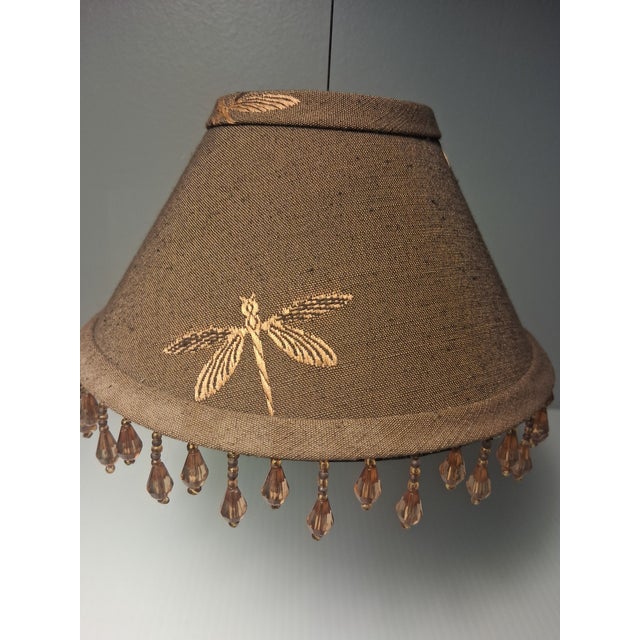 Beautiful Beaded & Embroidered Brown fabric clip on shades for candelabra or smaller lamp bulbs. Stores also do sell an...