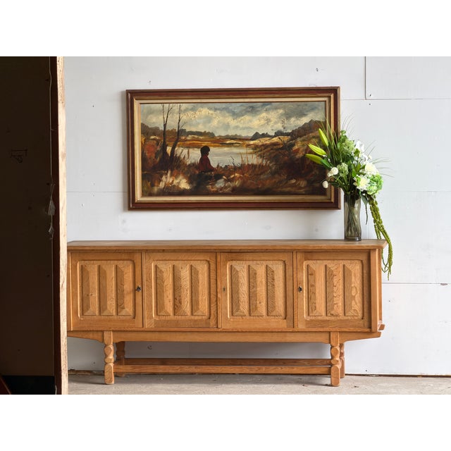 An oil on canvas figural landscape painting, signed "p. Anders," european, circa 1960s–1970s. A solitary seated figure —...