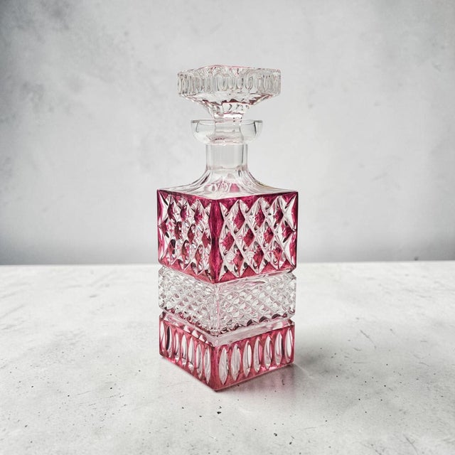 This vintage whiskey decanter was produced in West Germany between approximately 1965 and 1980. Crafted in 24% lead...
