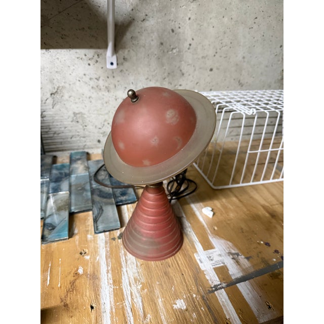 Pink/Salmon 1939 Worlds Fair Saturn Lamp. All original. Still works every time. Been in my family since the world’s fair.