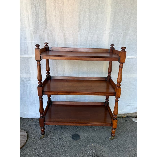 This is a beautiful 19th century English trolley or etagere. The shelves show such amazing patina and age and the turned...