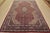 An authentic vintage traditional Sarouk rug hand-knotted with fine wool and natural dyes. This intricately woven rug...