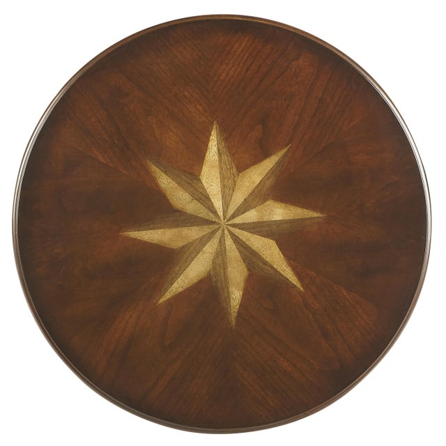 Elevate any room with the refined charm of the Butler Specialty Company Isla Round Side Table. Its starburst inlaid veneer...