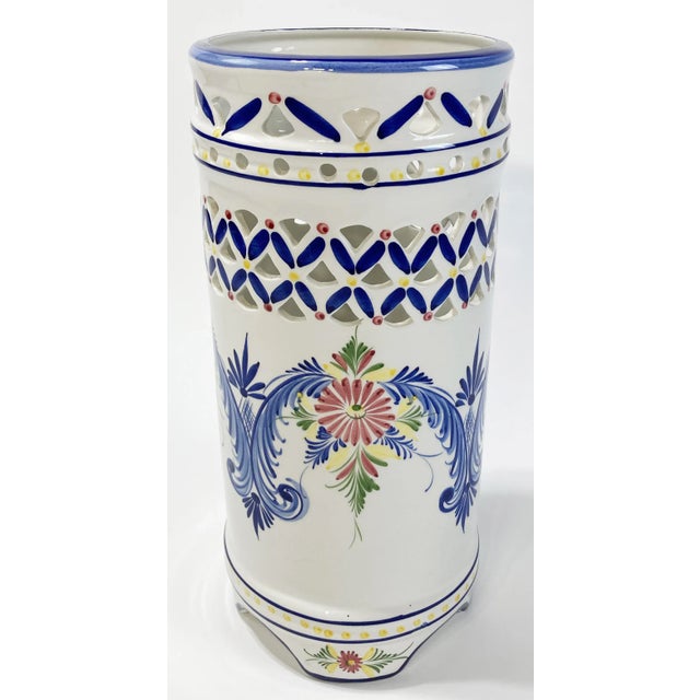 Make a statement in your entry or mudroom with this vintage reticulated hand-painted ceramic umbrella stand. Beautiful...