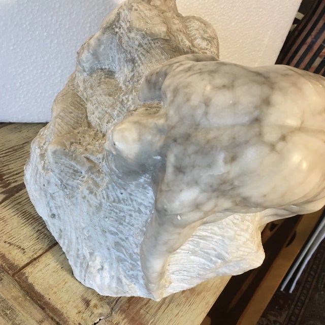 One of a kind fascinating hand carved marble sculpture with male figure in a backwards draped position. Wonderful subject,...