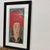 Design Plus Gallery presents a Watercolor Print by Vu Thu Hien. The print depicts a female figure in a large hat and rich...