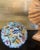 19th century majolica plate hand painted and decorated with a bird leaves and berries, the edging is scalloped. Made in...