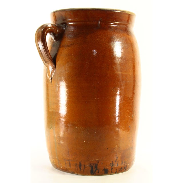 An amazing antique Southern pottery butter churn or crock Two applied handles, one larger and one supportive for pouring...
