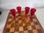 Set of 7 Thick barware glasses. 3 amber colored and 4 ruby red. In good condition.