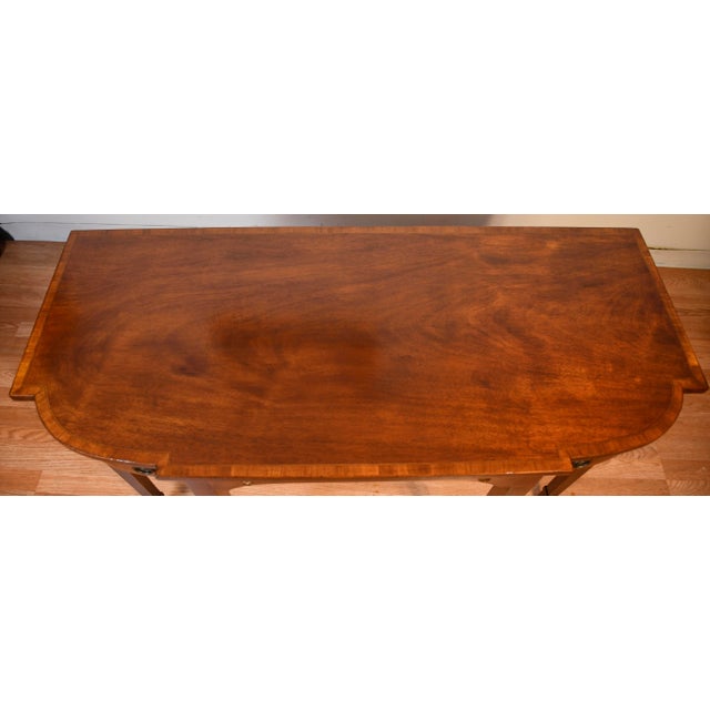 We are pleased to offer this beautiful English Regency Console table by Dokon N.Y Tradition Furniture, from the 1910s....