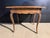 A pretty French Oak Side Table dating to the late 18th or early 19th Century. Having a single drawer to the front and...