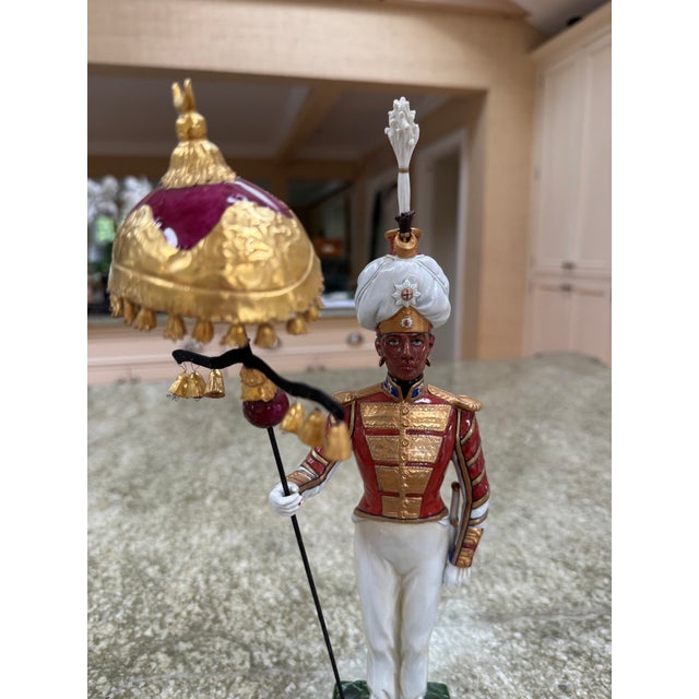A pair of German Sitzendorf figurines of Indian Coldstream Guards officers circa 1830