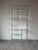Striking vintage 1960s six-tier étagère in the style of Charles Hollis Jones, featuring a sculptural clear Lucite frame...