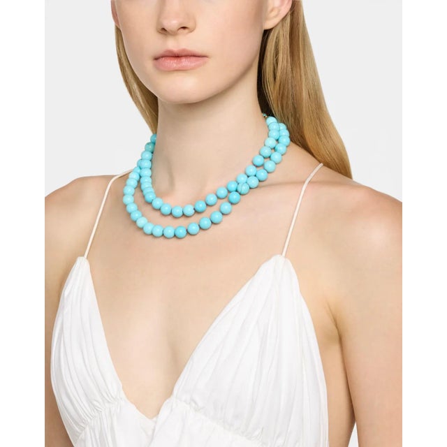 Stunning hue of turquoise Howlite. 36" - wear long or doubled. Bead size is 10mm.