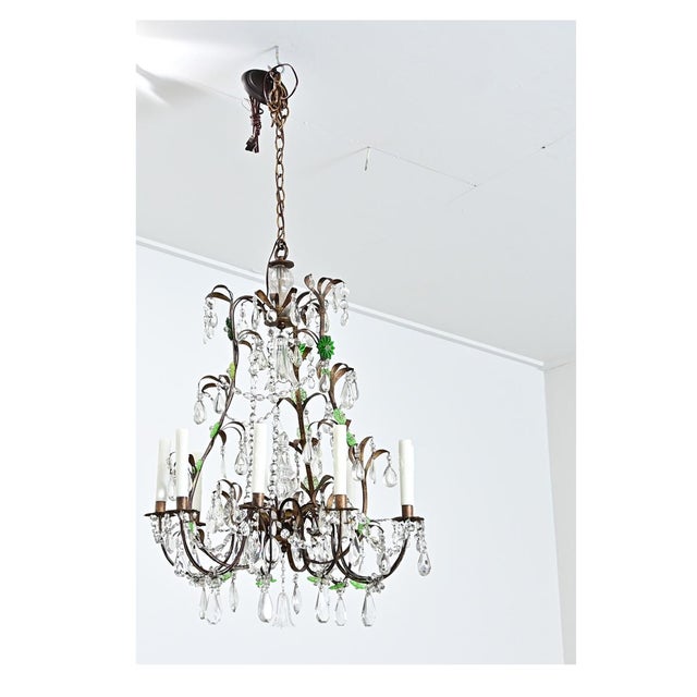 A foliate-themed 19th century French brass and crystal chandelier to illuminate your space with a touch of Bohemian and...