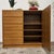 Authentic Danish teak storage cabinet by U.P. Møbler (Denmark). Mid-century piece featuring 5 drawers and a hinged-door...