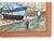 Vivid harbor scene of the Normandy coast, likely Honfleur, signed and dated 1994.&nbsp;The composition captures a large...
