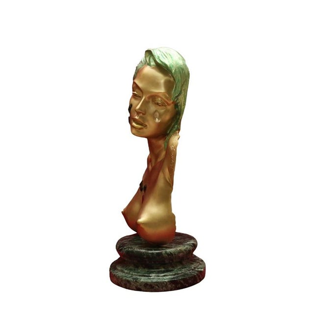 Dimensions: 24 cm wide, 18 cm deep, 44 cm high. Bronze sculpture created using the lost-wax casting technique, with a gold...