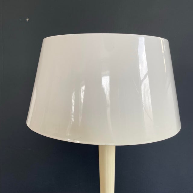 A mid century modern table lamp designed by Gerald Thursten