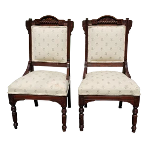 Pair of Victorian Carved Walnut and Upholstered Side Chairs