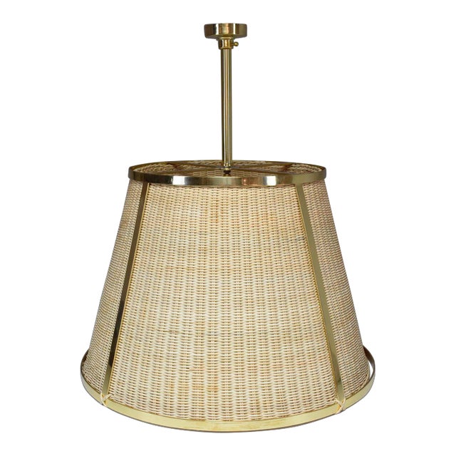 The Caeli-S contemporary handcrafted made-to-measure pendant light fixture features an expertly handcrafted brass...