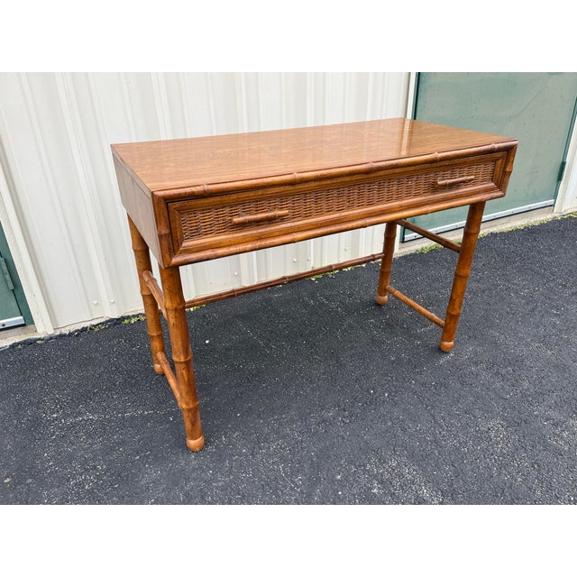 A fantastic mid century modern writing desk crafted by American of Martinsville. In the mid century modern and Hollywood...
