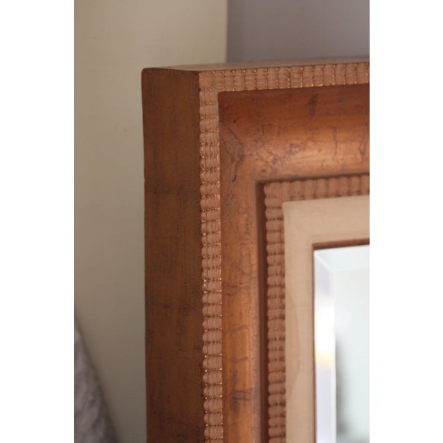 Large vintage floor mirror with bevelled mirror glass. Mirror could also be used as a large horizontal wall mirror. The...