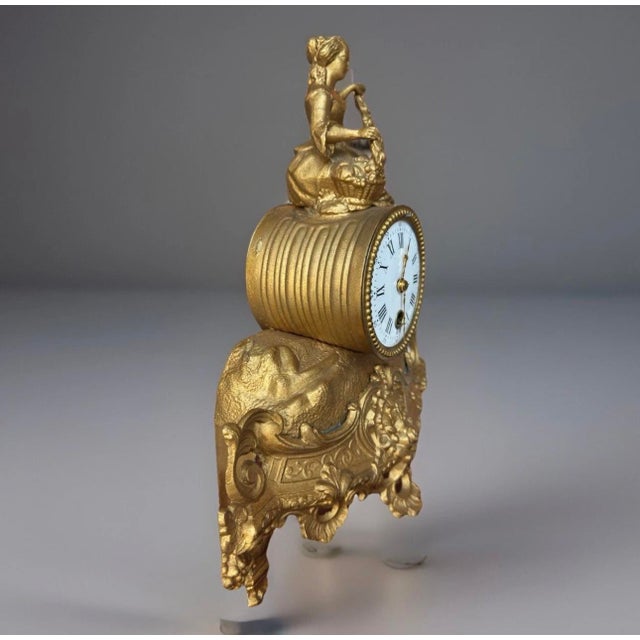 Beautiful 1880s-style reproduction mantle clock. The clock hands do not move, but it’s still a gorgeous decorative piece...