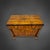 A Biedermeier writing desk with an architectural design, circa 1820. The body is flanked by two freestanding walnut...