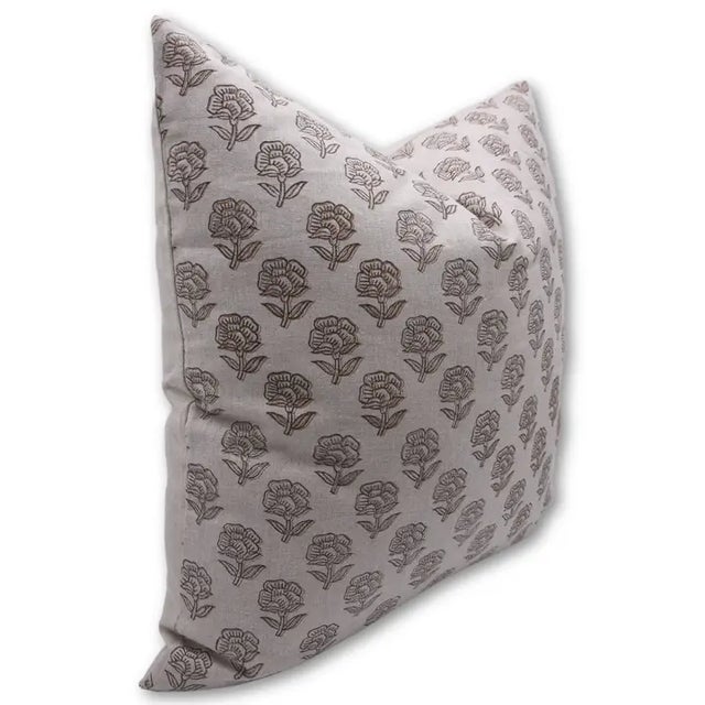 Elevate your home décor with the artisanal charm of the "Rohini" block print handmade cushion cover. Crafted from...