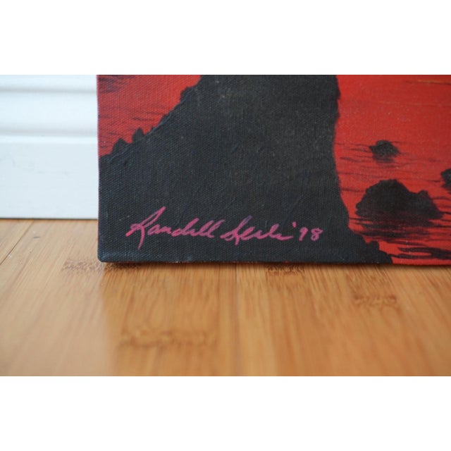 Sunset Sail – A serene seascape featuring a lone sailboat drifting amidst rocky outcrops, silhouetted against a fiery red...