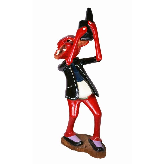 George Lilanga (1934 Kikwetu - 2005 Dar es Salaam), Sculpture of a red figure, circa 1995. Polychrome wood, 80 cm (height)...