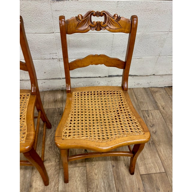 Wood Antique Carved Walnut Ladderback Cane Seat Carved Dining Chairs - Pair For Sale - Image 7 of 11