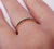 Black Diamond eternity wedding band set in 14K Rose gold. Pave set brilliant round diamonds are natural black. Carat...