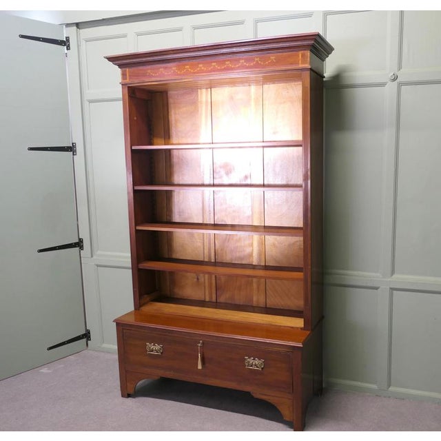 Tall Edwardian Walnut Bookcase This great piece comes into 2, the top part is an open fronted bookcase with adjustable...