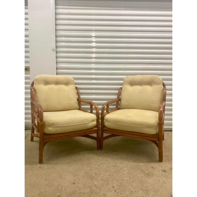 This is a vintage Ficks Reed style mid-century modern rattan and bamboo lounge chair, likely designed by John Wisner in...